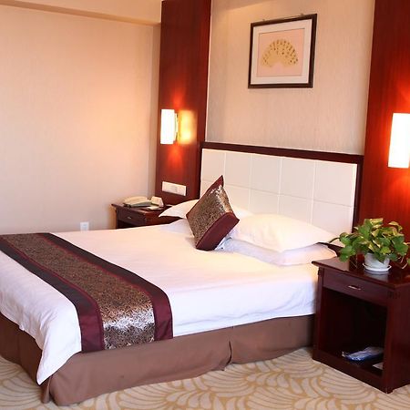 Tianhong Hotel Heze Quarto foto