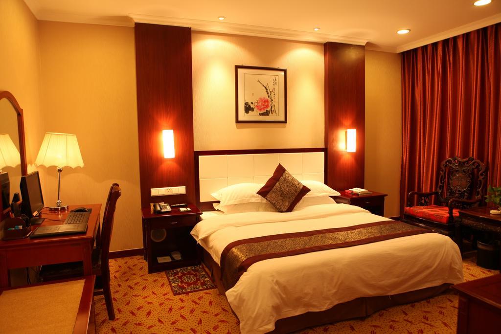 Tianhong Hotel Heze Quarto foto